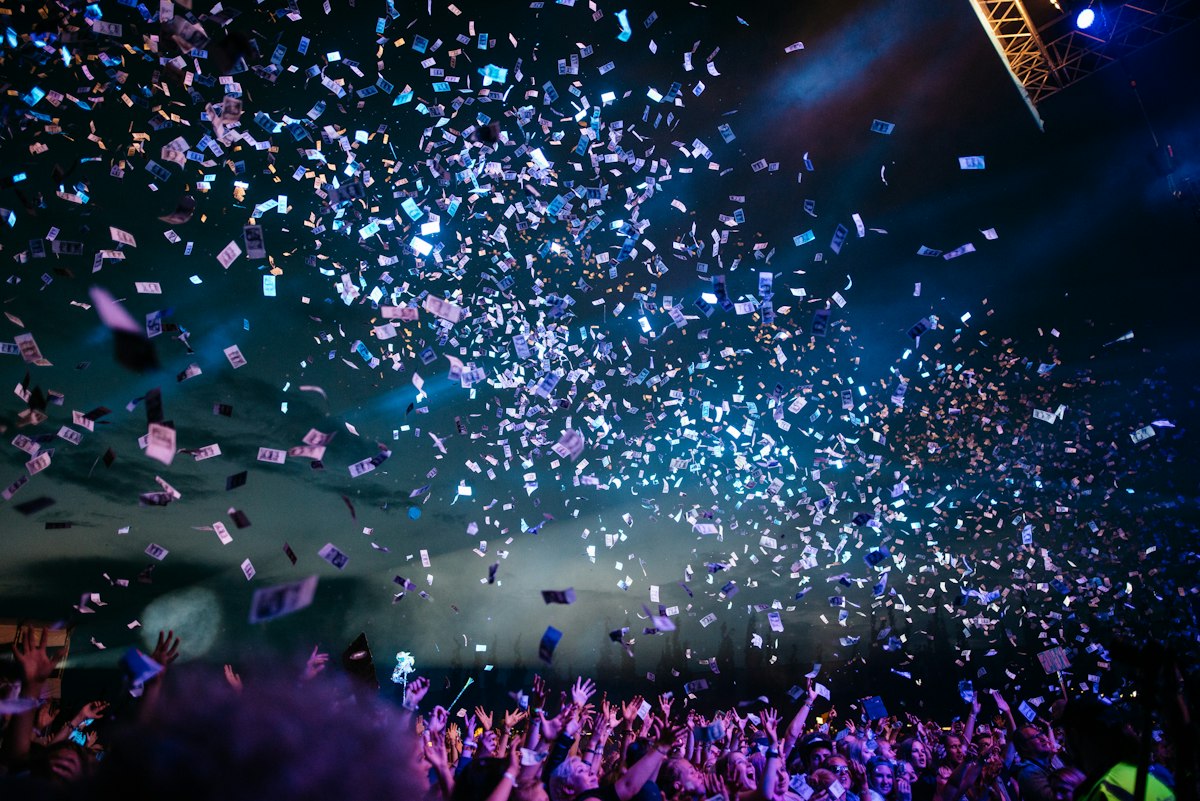 Live music event with stage lights and crowd