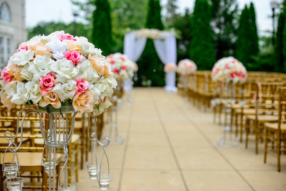 Outdoor wedding celebration with string lights